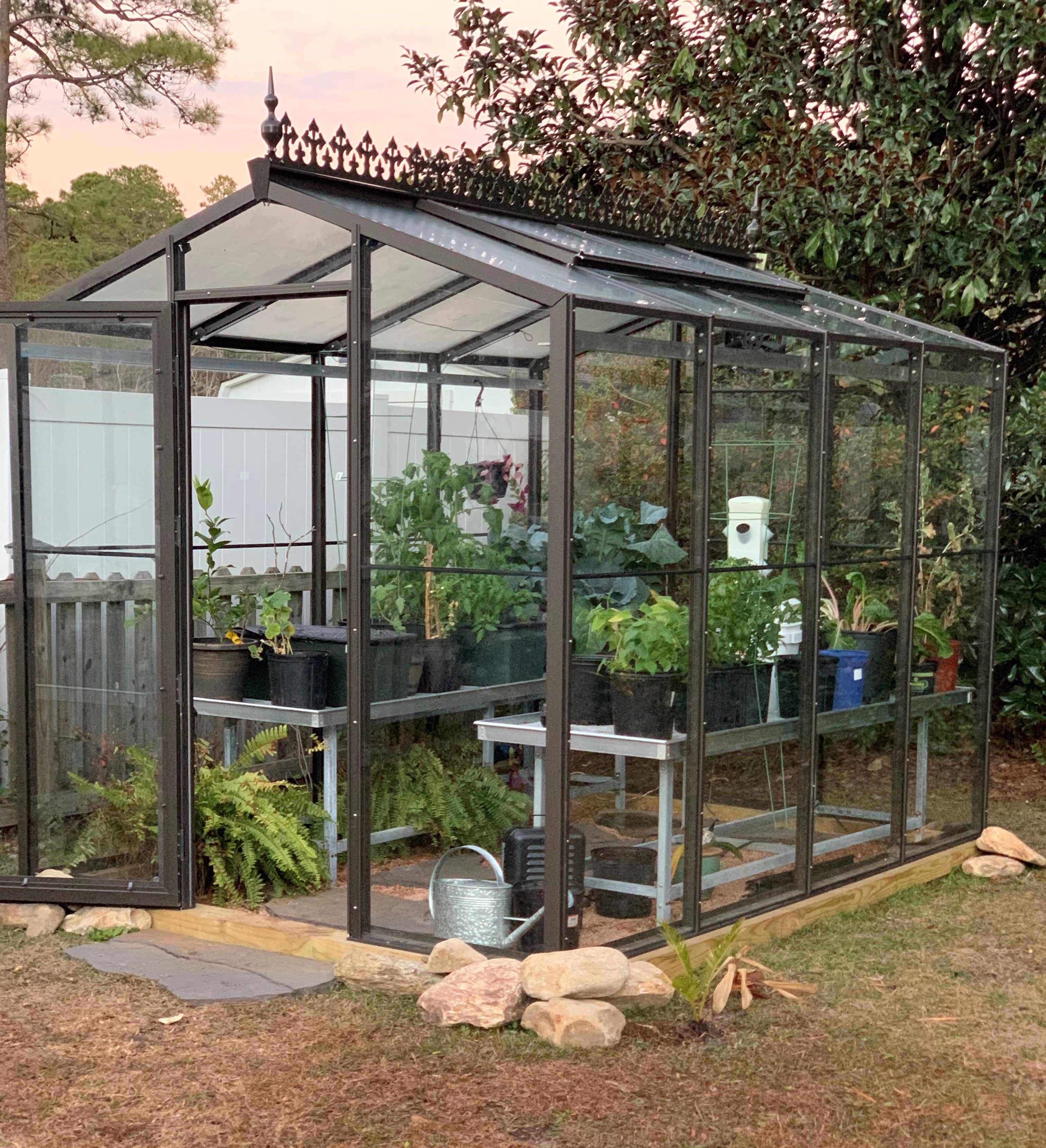 Palmetto greenhouse with bronze frame and polycarbonate panels